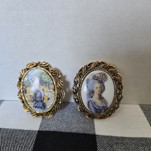 The Unbranded Brand Jewelry - Lot of 2 Gold Tone Metal Framed Victorian Inspired Brooches of Female Subjects